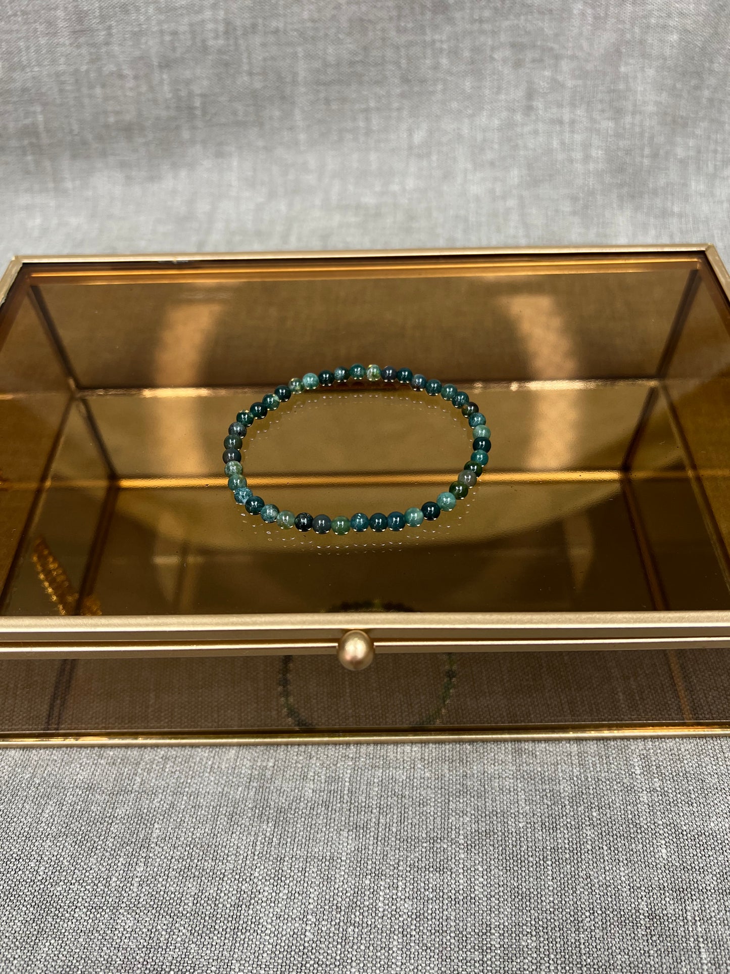 Mosagaat (donker) kogelarmband 4mm